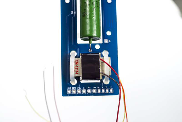 Close-up of CM-13114 wire connections: Red=Pin 1, Brown=Pin 2.